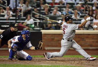 NEW YORK - JUNE 23:  Albert Pujols #5 of the St. Louis Cardinals strikes out against the New York Mets at Citi Field on June 23, 2009 in the Flushing neighborhood of the Queens borough of New York City.  (Photo by Michael Heiman/Getty Images)