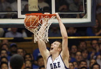 DURHAM, NC - MARCH 03:  Kyle Singler #12 of the Duke Blue Devils dunks against the Florida State Seminoles during the game on March 3, 2009 at Cameron Indoor Stadium in Durham, North Carolina.  (Photo by Kevin C. Cox/Getty Images)
