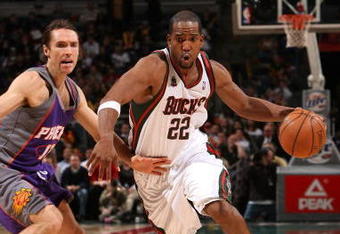 MILWAUKEE - JANUARY 22:  Michael Redd #22 of the Milwaukee Bucks drives against Steve Nash #13 of the Phoenix Suns at the Bradley Center on January 22, 2008 in Milwaukee, Wisconsin. The Suns won 114-105. NOTE TO USER: User expressly acknowledges and agrees that, by downloading and/or using this Photograph, user is consenting to the terms and conditions of the Getty Images License Agreement.  (Photo by Jonathan Daniel/Getty Images)