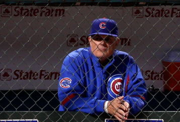 CHICAGO - OCTOBER 02:  Manager Lou Piniella #41 of the Chicago Cubs looks on from the dugout against the Los Angeles Dodgers in Game Two of the NLDS during the 2008 MLB Playoffs at Wrigley Field on October 2, 2008 in Chicago, Illinois.  (Photo by Jamie Squire/Getty Images)
