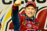 JOLIET, IL - JULY 11:  Mark Martin, driver of the #5 CARQUEST/Kellogg's Chevrolet, celebrates in victory lane after winning the NASCAR Sprint Cup Series LifeLock.com 400 at Chicagoland Speedway on July 11, 2009 in Joliet, Illinois.  (Photo by John Harrelson/Getty Images)