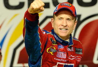 JOLIET, IL - JULY 11:  Mark Martin, driver of the #5 CARQUEST/Kellogg's Chevrolet, celebrates in victory lane after winning the NASCAR Sprint Cup Series LifeLock.com 400 at Chicagoland Speedway on July 11, 2009 in Joliet, Illinois.  (Photo by John Harrelson/Getty Images)
