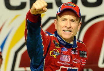 JOLIET, IL - JULY 11:  Mark Martin, driver of the #5 CARQUEST/Kellogg's Chevrolet, celebrates in victory lane after winning the NASCAR Sprint Cup Series LifeLock.com 400 at Chicagoland Speedway on July 11, 2009 in Joliet, Illinois.  (Photo by John Harrelson/Getty Images)