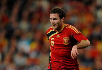 MADRID, SPAIN - MARCH 28:  Juan Mata of Spain runs with the ball during the FIFA2010 World Cup Qualifier match between Spain and Turkey at the Estadio Santiago Bernabeu on March 28, 2009 in Madrid, Spain. Spain won the match 1-0.  (Photo by Jasper Juinen/Getty Images)