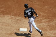 CHICAGO - JUNE 28: Alexei Ramirez #10 of the Chicago White Sox runs the bases after hitting a two-run home run against the Chicago Cubs on June 28, 2009 at U.S. Cellular Field in Chicago, Illinois. The White Sox defeated the Cubs 6-0. (Photo by Jonathan Daniel/Getty Images)