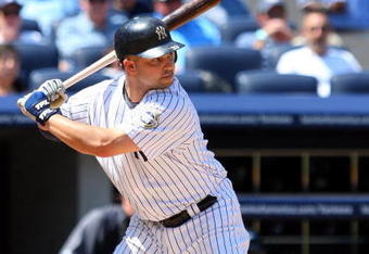 NEW YORK - JULY 06:  Nick Swisher #33 of the New York Yankees bats against the Toronto Blue Jays on July 6, 2009 at Yankee Stadium in the Bronx borough of New York City. The Jays defeated the yankees 7-6.  (Photo by Jim McIsaac/Getty Images)