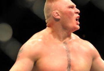 LAS VEGAS - JULY 11:  Brock Lesnar reacts after knocking out Frank Mir during their heavyweight title bout during UFC 100 on July 11, 2009 in Las Vegas, Nevada.  (Photo by Jon Kopaloff/Getty Images)