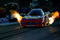 CONCORD, NC - SEPTEMBER 12:  Ron Capps, driver of the NAPA funny car leaves the line during second round qualifying for the NHRA Carolinas Nationals at the Zmax Dragway on September 12, 2008 in Concord, North Carolina.  (Photo by Rusty Jarrett/Getty Images)