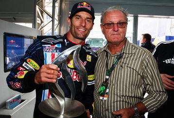 NURBURG, GERMANY - JULY 12:  Mark Webber (L) of Australia and Red Bull Racing celebrates with his father Alan Webber in the paddock after winning the German Formula One Grand Prix at Nurburgring on July 12, 2009 in Nurburg, Germany.  (Photo by Clive Mason/Getty Images)