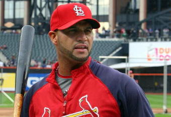 NEW YORK - JUNE 22:  Albert Pujols #5 of the St. Louis Cardinals looks on during batting practice before playing the New York Mets on June 22, 2009 at Citi Field in the Flushing neighborhood of the Queens borough of New York City.  (Photo by Jim McIsaac/Getty Images)