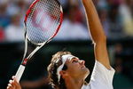 WIMBLEDON, ENGLAND - JULY 05:  Roger Federer of Switzerland serves during the men's singles final match against Andy Roddick of USA on Day Thirteen of the Wimbledon Lawn Tennis Championships at the All England Lawn Tennis and Croquet Club on July 5, 2009 in London, England.  (Photo by Paul Gilham/Getty Images)