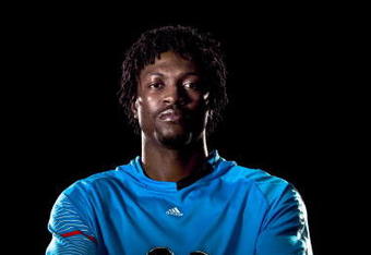 UNDATED - UNSPECIFIED:   In this handout image provided by adidas, Emmanuel Adebayor of Arsenal and Togo with his new adidas F50i football boots and training kit.  (Photo by Getty Images for adidas)