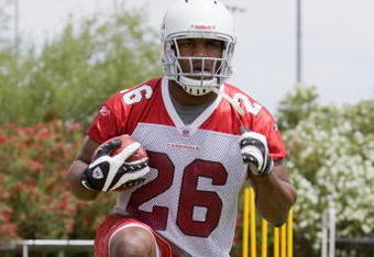 TEMPE, AZ - MAY 2 :  Chris Wells #26 of the Arizona Cardinals runs drills during a team minicamp at the team training facility on May 2, 2009 in Tempe, Arizona.  (Photo by Jonathan Willey/Getty Images)