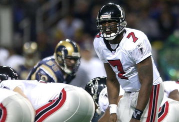 6 Jan 2002: Michael Vick #7 of the Atlanta Falcons calls out the play against the St. Louis Rams at the Dome at America's Center in St. Louis, Missouri. The St. Louis Rams beat the Atlanta Falcons 31-13.  DIGITAL IMAGE. Mandatory Credit: Elsa /Getty Images