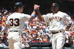 SAN FRANCISCO - JUNE 21:  Randy Winn #2 of the San Francisco Giants celebrates with Aaron Rowand #33 after scoring in the third inning against the Texas Rangers during a Major League Baseball game on June 21, 2009 at AT&T Park in San Francisco, California.  (Photo by Jed Jacobsohn/Getty Images)