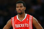 LOS ANGELES, CA - MAY 12:  Aaron Brooks #0 of the Houston Rockets looks on against the Los Angeles Lakers in Game Five of the Western Conference Semifinals during the 2009 NBA Playoffs at Staples Center on May 12, 2009 in Los Angeles, California. NOTE TO USER: User expressly acknowledges and agrees that, by downloading and or using this photograph, User is consenting to the terms and conditions of the Getty Images License Agreement.  (Photo by Stephen Dunn/Getty Images)