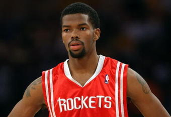 LOS ANGELES, CA - MAY 12:  Aaron Brooks #0 of the Houston Rockets looks on against the Los Angeles Lakers in Game Five of the Western Conference Semifinals during the 2009 NBA Playoffs at Staples Center on May 12, 2009 in Los Angeles, California. NOTE TO USER: User expressly acknowledges and agrees that, by downloading and or using this photograph, User is consenting to the terms and conditions of the Getty Images License Agreement.  (Photo by Stephen Dunn/Getty Images)