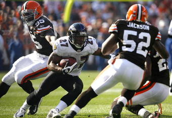 CLEVELAND - NOVEMBER 2:  Ray Rice #27 of the Baltimore Ravens runs the ball by Kamerion Wimbley #95 and D'Qwell Jackson #52 of the Cleveland Browns during the third quarter of their NFL game at Cleveland Browns Stadium November 2, 2008 in Cleveland, Ohio.  (Photo by Matt Sullivan/Getty Images)