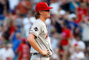 ARLINGTON, TX - JULY 1:  Pitcher Jered Weaver #36 of the Los Angeles Angels of Anaheim reacts after giving up a homerun against Hank Blalock #9 of the Texas Rangers in the fourth inning at Rangers Ballpark July 1, 2009 in Arlington, Texas.  (Photo by Ronald Martinez/Getty Images)