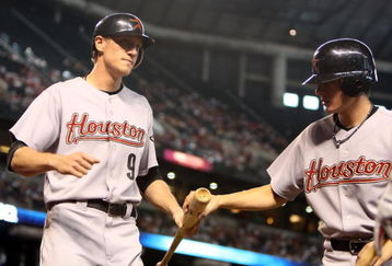 PHOENIX - JUNE 14:  Hunter Pence #9 of the Houston Astros scores a run during the major league baseball game against the Arizona Diamondbacks  at Chase Field on June 14, 2009 in Phoenix, Arizona.   The Astros defeated the Diamondbacks 8-3.  (Photo by Christian Petersen/Getty Images)