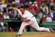BOSTON - JULY 07: Josh Beckett #19 of the Boston Red Sox delivers a pitch in the first inning against the Oakland Athletics on July 7, 2009 at Fenway Park in Boston, Massachusetts. (Photo by Elsa/Getty Images)