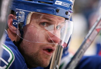 VANCOUVER, CANADA - MARCH 30:   Markus Naslund #19, captain of the Vancouver Canucks, watches the action during the  game against Calgary Flames at General Motors Place on March 30, 2008, in Vancouver, Canada.   (Photo by Kim Stallknecht/Getty Images)  