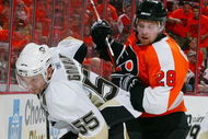 PHILADELPHIA - APRIL 25:  Sergei Gonchar #55 of the Pittsburgh Penguins skates against Claude Giroux #28 of the Philadelphia Flyers during Game Six of the Eastern Conference Quarterfinal Round of the 2009 NHL Stanley Cup Playoffs  at the Wachovia Center on April 25, 2009 in Philadelphia, Pennsylvania. The Penguins defeated the Flyers 5-3 to win the series 4 games to 2.  (Photo by Jim McIsaac/Getty Images)