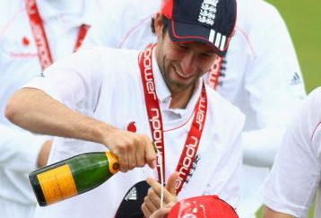 CHESTER-LE-STREET, ENGLAND - MAY 18:  Graham Onions of England pours champagne over Andrew Strauss of England after their win over West Indies during day five of the 2nd npower test match between England and West Indies at The Riverside on May 18, 2009 in Chester-le-Street, England.  (Photo by Julian Finney/Getty Images)