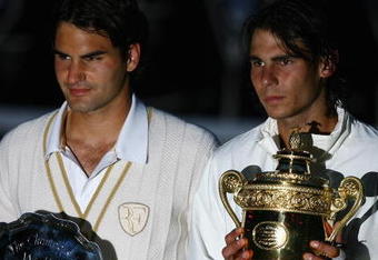 LONDON - JULY 06:  Rafael Nadal of Spain and Roger Federer of Switzerland pose for pictures with after Nadal won in five sets in the final on day thirteen of the Wimbledon Lawn Tennis Championships at the All England Lawn Tennis and Croquet Club on July 6, 2008 in London, England.  (Photo by Julian Finney/Getty Images)