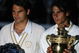 LONDON - JULY 06:  Rafael Nadal of Spain and Roger Federer of Switzerland pose for pictures with after Nadal won in five sets in the final on day thirteen of the Wimbledon Lawn Tennis Championships at the All England Lawn Tennis and Croquet Club on July 6, 2008 in London, England.  (Photo by Julian Finney/Getty Images)
