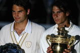 LONDON - JULY 06:  Rafael Nadal of Spain and Roger Federer of Switzerland pose for pictures with after Nadal won in five sets in the final on day thirteen of the Wimbledon Lawn Tennis Championships at the All England Lawn Tennis and Croquet Club on July 6, 2008 in London, England.  (Photo by Julian Finney/Getty Images)