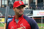 NEW YORK - JUNE 22:  Albert Pujols #5 of the St. Louis Cardinals looks on during batting practice before playing the New York Mets on June 22, 2009 at Citi Field in the Flushing neighborhood of the Queens borough of New York City.  (Photo by Jim McIsaac/Getty Images)