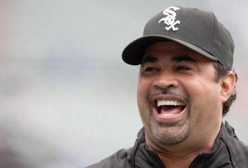 CHICAGO - JUNE 17: Manager Ozzie Guillen #13 of the Chicago White Sox jokes during batting practice before an interleague game against the Chicago Cubs on June 17, 2009 at Wrigley Field in Chicago, Illinois. (Photo by Jonathan Daniel/Getty Images)