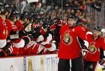 OTTAWA - FEBRUARY 26:  Dany Heatley #15 and Mike Fisher #12 of the Ottawa Senators celebrate a goal against the San Jose Sharks in a game on February 26, 2009 at the Scotiabank Place in Ottawa, Canada. (Photo by Phillip MacCallum/Getty Images)