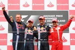 NURBURG, GERMANY - JULY 12:  Mark Webber (2nd right) of Australia and Red Bull Racing celebrates with third placed Felipe Massa (right) of Brazil and Ferrari, second placed Sebastian Vettel (2nd left) of Germany and Red Bull Racing and Red Bull Racing Team Manager Jonathan Wheatley on the podium after winning the German Formula One Grand Prix at Nurburgring on July 12, 2009 in Nurburg, Germany.  (Photo by Mark Thompson/Getty Images)