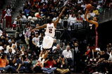 ATLANTA - APRIL 22:  Jamario Moon 38 of the Miami Heat hits a three-pointer as Joe Johnson #2 of the Atlanta Hawks gets a hand up during Game Two of the Eastern Conference Quarterfinals at Philips Arena on April 22, 2009 in Atlanta, Georgia. The Heat defeated the Hawks 108-93. NOTE TO USER: User expressly acknowledges and agrees that, by downloading and/or using this Photograph, user is consenting to the terms and conditions of the Getty Images License Agreement.  (Photo by Doug Benc/Getty Images)