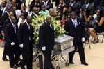 HATTIESBURG, MS - JULY 11:   Pall bearers depart the funeral service for former NFL quarterback Steve McNair on July 11, 2009 in Hattiesburg, Mississippi.  (Photo by George Clark - Hattiesburg American POOL/Getty Images)