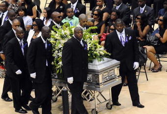 HATTIESBURG, MS - JULY 11:   Pall bearers depart the funeral service for former NFL quarterback Steve McNair on July 11, 2009 in Hattiesburg, Mississippi.  (Photo by George Clark - Hattiesburg American POOL/Getty Images)