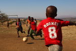 NATAL, SOUTH AFRICA - JULY 03:  Local children play football in a Zulu village on July 3, 2009 near to Rorke's Drift in Natal, South Africa. (Photo by Alex Livesey/Getty Images)