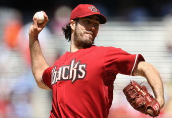 PHOENIX - APRIL 12:  Starting pitcher Dan Haren #15 of the Arizona Diamondbacks pitches against the Los Angeles Dodgers during the game at Chase Field on April 12, 2009 in Phoenix, Arizona.  (Photo by Christian Petersen/Getty Images)