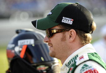 JOLIET, IL - JULY 11: Dale Earnhardt Jr., driver of the #88 AMP Energy/National Guard Chevrolet, stands on pit road before the start of the NASCAR Sprint Cup Series LifeLock.com 400 at Chicagoland Speedway on July 11, 2009 in Joliet, Illinois.  (Photo by John Harrelson/Getty Images)