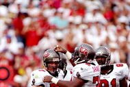 31 Aug 1997:  Defensive linemen Brad Culpepper (let) and Chidi Ahanotu of the Tampa Bay Buccaneers celebrate during a game against the San Francisco 49ers at Houlihan''s Stadium in Tampa, Florida.  The Buccaneers won the game, 13-6. Mandatory Credit: Scott Halleran  /Allsport