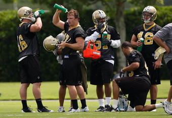 METAIRIE, LA - MAY 08:  Members of the New Orleans Saints take a break to cool off in the heat during the Rookie Minicamp at the New Orleans Saints Training Facility on May 8, 2009 in Metairie, Louisiana.  (Photo by Chris Graythen/Getty Images)