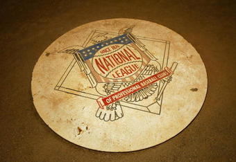 HOUSTON - MAY 25:  The National League Baseball logo on the field behind the plate during the game between the Chicago Cubs and the Houston Astros at Minute Maid Park on May 25, 2004 in Houston, Texas. The Astros won 5-0. (Photo by Ronald Martinez/Getty Images)