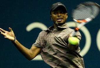 BANGKOK, THAILAND - SEPTEMBER 24: Donald Young of the USA returns a shot in his match against Jurgen Melzer of Austria on day two of the Thailand Open at Impact Arena on September 24, 2008 in Bangkok, Thailand.  (Photo by Robert Cianflone/Getty Images)