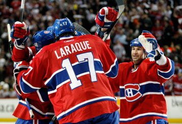 MONTREAL- APRIL 20:  Members of the Montreal Canadiens celebrate the second period goal by Yannick Weber #68 during Game Three of the Eastern Conference Quarterfinals of the 2009 Stanley Cup Playoffs against the Boston Bruins at the Bell Centre on April 20, 2009 in Montreal, Quebec, Canada.  The Bruins defeated the Canadiens 4-2.  (Photo by Richard Wolowicz/Getty Images)