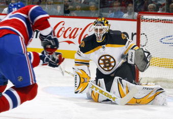 MONTREAL, CANADA - OCTOBER 22:  Manny Fernandez #35 of the Boston Bruins makes a glove save off a hard wrist shot by Tomas Plekanec #14 of the Montreal Canadiens during second period action on October 22, 2007 at the Bell Centre in Montreal, Quebec. The Montreal Canadiens lead the Boston Bruins 3-0 after the second period.  (Photo by Phillip MacCallum/Getty Images)