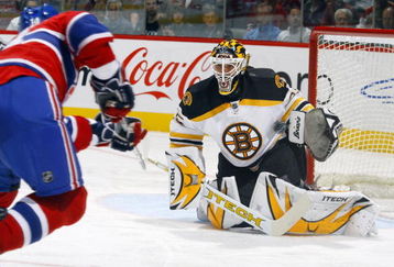 MONTREAL, CANADA - OCTOBER 22:  Manny Fernandez #35 of the Boston Bruins makes a glove save off a hard wrist shot by Tomas Plekanec #14 of the Montreal Canadiens during second period action on October 22, 2007 at the Bell Centre in Montreal, Quebec. The Montreal Canadiens lead the Boston Bruins 3-0 after the second period.  (Photo by Phillip MacCallum/Getty Images)
