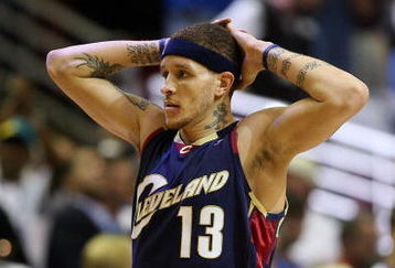 ORLANDO, FL - MAY 30:  Delonte West #13 of the Cleveland Cavaliers reacts after a play against the Orlando Magic in Game Six of the Eastern Conference Finals during the 2009 Playoffs at Amway Arena on May 30, 2009 in Orlando, Florida. NOTE TO USER: User expressly acknowledges and agrees that, by downloading and or using this photograph, User is consenting to the terms and conditions of the Getty Images License Agreement  (Photo by Elsa/Getty Images)