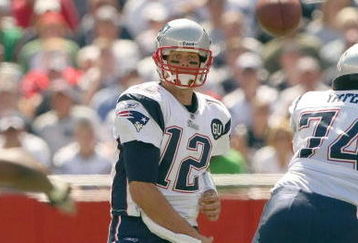 FOXBORO, MA - SEPTEMBER 7:  Quarterback Tom Brady #12 of the New England Patriots passes the ball up the middle during their NFL game against the Kansas City Chiefs on September 7, 2008 at Gillette Stadium in Foxboro, Massachusetts. The Patriots defeated the Chiefs 17-10. (Photo by Elsa Garrison/Getty Images)